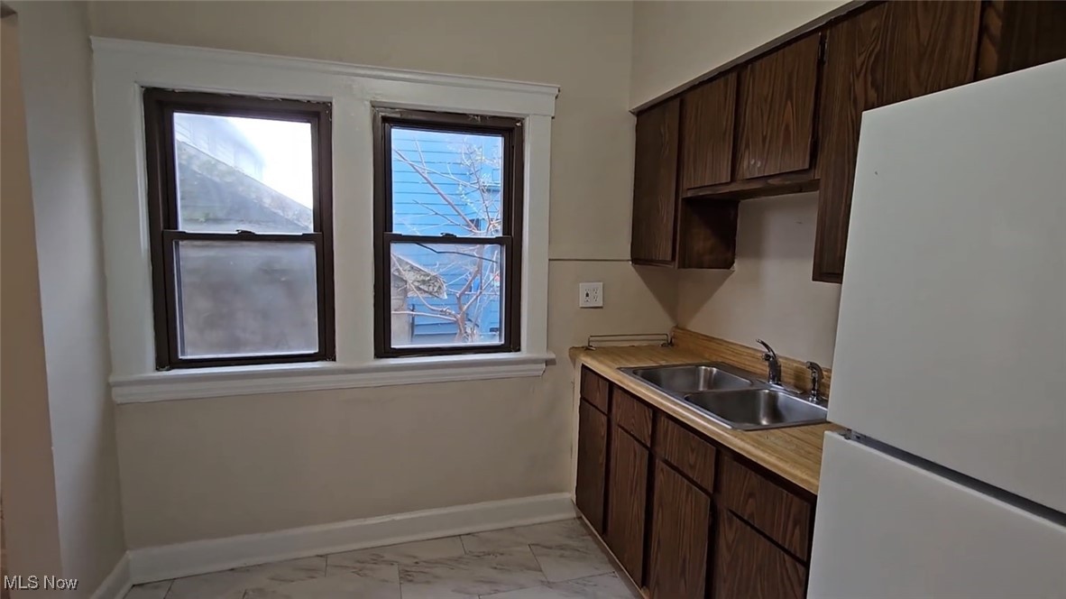 W J Lang Denison Ave - Residential Income