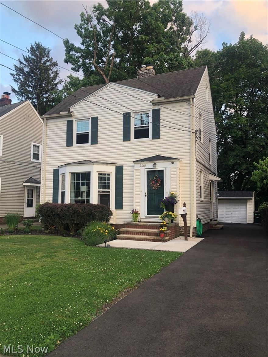 Check out this thoughtfully remodeled, absolutely beautiful Colonial offers wonderful views and shows absolutely pristine. From the moment you pull up, you can feel the love and care the owner has poured into this home.

As you enter the front door, you are welcomed into the living room featuring beautifully refinished hardwood floors, a coved ceiling, arched doorways, and a fireplace as the focal point. The space flows nicely into the dining room, where you will also find a delightful three-season room, perfect for enjoying the adorable backyard and scenic views.

The kitchen is a true standout, featuring shaker-style soft-close cabinetry with brushed gold hardware, quartz countertops, a tile backsplash, and stainless steel appliances. The sink is thoughtfully placed beneath the rear window so you can enjoy views of the property while you work in the kitchen. Completing the first floor is a convenient half bath located near the side entry.

On the second floor, you will find three bedrooms, all featuring refurbished wood floors, neutral paint, beautiful natural light, and access to the balcony. The full bath has been thoughtfully remodeled.

The third floor offers a large, spacious bedroom or additional living space, providing great flexibility for a variety of needs.

The partially finished basement features fresh paint, recessed lighting, and glass-block windows, making it a perfect den or recreation area. The unfinished section includes a workbench, mechanicals, and a nicely arranged laundry area.

Get ready for summer evenings relaxing on the deck while enjoying the beautiful views and charming yard. The beautifully landscaped property is accented with an adorable picket fence.