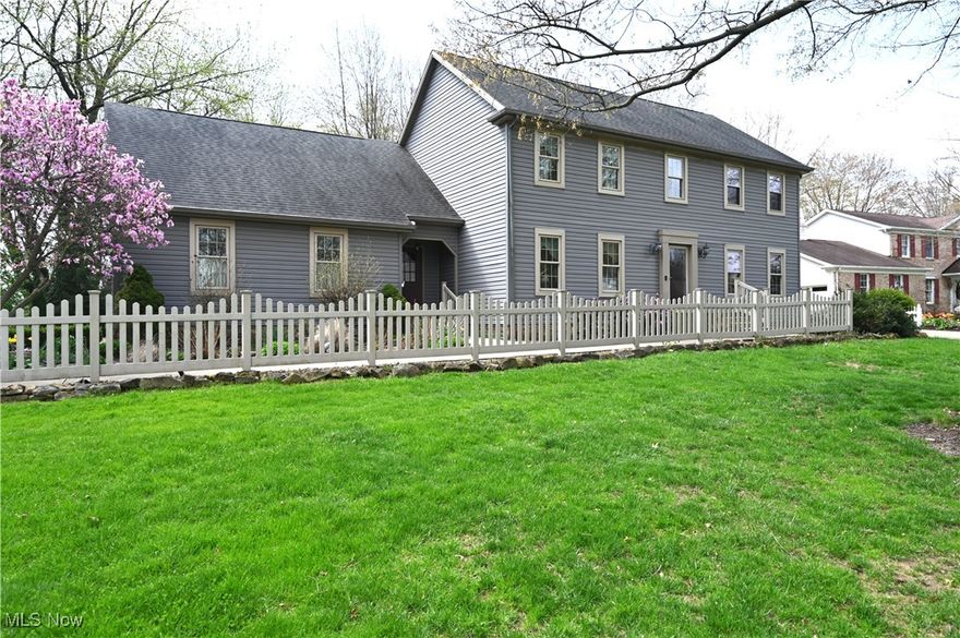 Welcome to 3647 Sperone Court. Situated on almost a full acre, this charming, 4-bed, 4-bath Williamsburg Colonial sits on a premier cul-de-sac street in Canfield Township within the Canfield School District! This home offers a splendid example of early American charm, coupled with today’s modern conveniences, providing unparalleled comfort boasting character once you enter the front door. You are welcomed to a formal entry, noticing a nice size living room then on to a spacious family room, with a gas fireplace and a large wet bar. The adjoining Sunroom boasts breathtaking views through newer, over-size windows. Beautiful country kitchen with all appliances staying, including built-ins. Adjacent the large dining room & kitchen is a very spacious walk-thru Butler’s Pantry which can easily be used as a serving/buffet area. Upstairs, via two-story foyer, to three bedrooms with a spacious primary, boasting a large ensuite, with another full bath. The east side of the home, on second level of the house offers a 4th HUGE bedroom (or office) with a full bath with the only access via a separate staircase, opposite of the kitchen. (Possible in-law suite or maybe a rental!) Many built-in and TONS of storage are in this unique room.
Genuine hardwood floors adorn both levels of this lovely home (except three bedrooms) including plantation blinds on all single hung windows. Convenient laundry off of kitchen area. Prime location ensures quick access to prominent local dining, retail and attractions and Mill Creek Park, all just moments away. The outside presents lovely gardens encircling the home as well as a very private and heavily treed back yard with shed and a very private paver patio and Sun Setter awning for those nice summer parties and get togethers.  New HVAC and stove. Newer Thermopane windows, some triple-pane. Clean and dry basement and three-car garage.  Seller is offering a SUPREME 2-10 Home Warranty. Call for your private showing today!