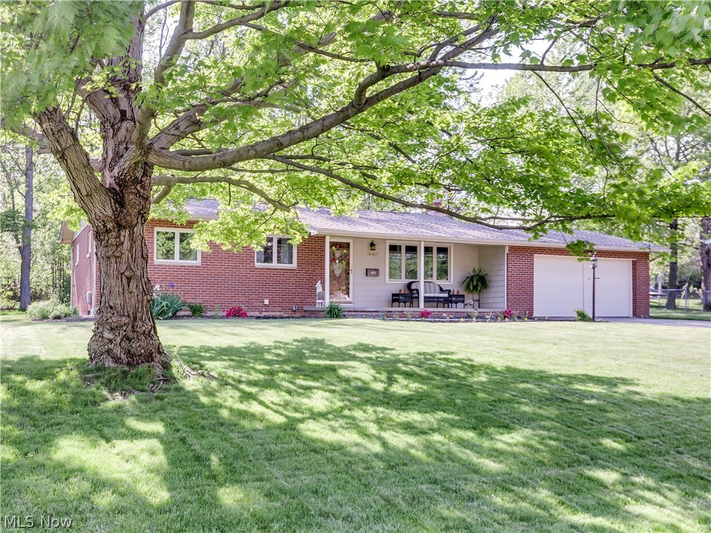 This quality brick ranch is meticulously maintained and ready for you to call home. The subtle décor allows for its new buyer to add color with their own furnishings. Gleaming wood flooring is featured throughout. Updates include both bathrooms, kitchen, stainless steel appliances, windows, roof. furnace and A/C garage door opener, brick walkway, landscaping, outdoor lighting and drains from gutters to street. An inviting front porch and spacious covered patio allows for outdoor enjoyment. The attached two car garage also adds to the convenience of this super property. Truly an awesome find! Call for your private showing today.