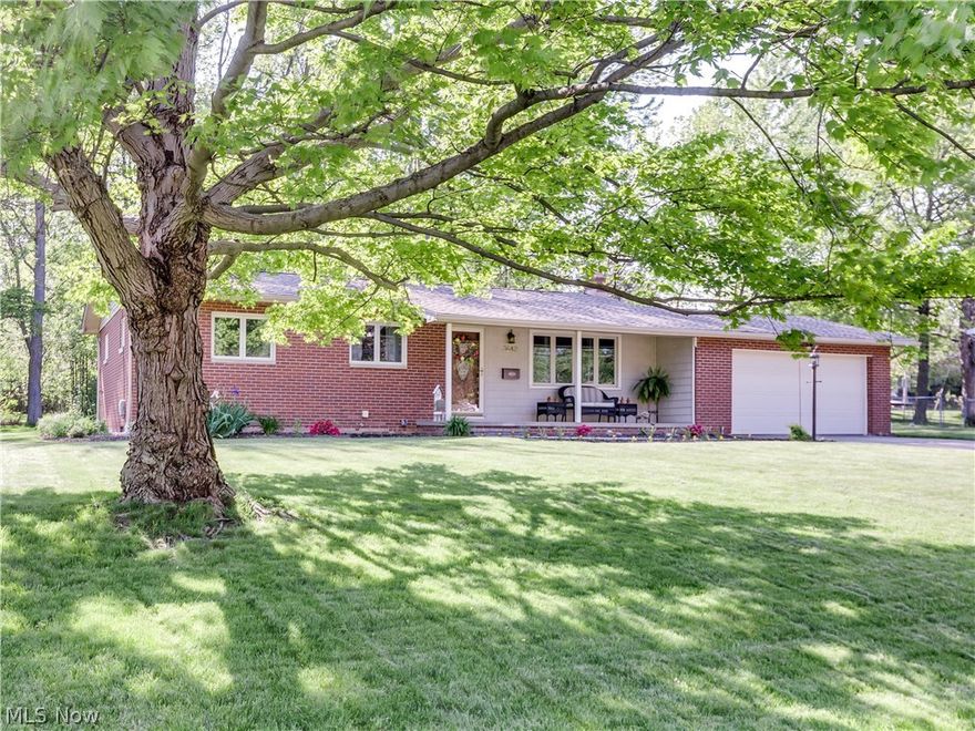 This quality brick ranch is meticulously maintained and ready for you to call home.  The subtle décor allows for its new buyer to add color with their own furnishings.  Gleaming wood flooring is featured throughout.  Updates include both bathrooms, kitchen, stainless steel appliances, windows, roof. furnace and A/C garage door opener, brick walkway, landscaping, outdoor lighting and drains from gutters to street.  An inviting front porch and spacious covered patio allows for outdoor enjoyment.  The attached two car garage also adds to the convenience of this super property. Truly an awesome find!   Call for your private showing today.