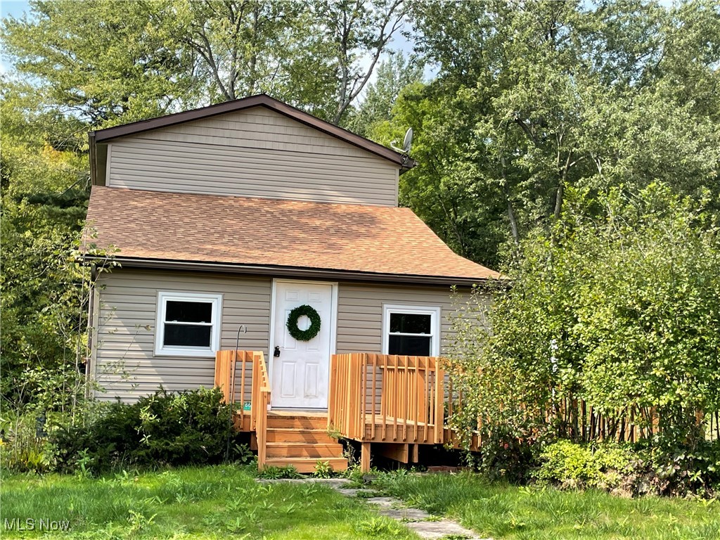 Welcome to a neat and well maintained lake community home. This spacious 2 BR 2 Full Bath single family home
on .36 acres with large flat backyard and mature trees beckons you to find out all that's inside. Originally built as a
summer cottage, it was remodeled in the 1990's to add a first floor living/dining room, family room, storage, eat-in
kitchen and full bathroom, a 2nd floor with 2 spacious bedrooms and a full bathroom, a full basement with laundry, walk
out stairs to outside, and a new electric panel and wiring. Recent updates include newer roof, newer siding, most windows
are new, heat pump and air handler 12/2024. Septic replaced 8/2023, newer carpet, kitchen and upstairs bath flooring,
basement drywall and exterior waterproofing, Nature stone floor in the basement, limestone on the driveway. Come make
this cheerful home yours today! Please verify all measurements in your due diligence. All appliances are included, new
refrigerator, dryer 8/2023 and washing machine 11/2024.