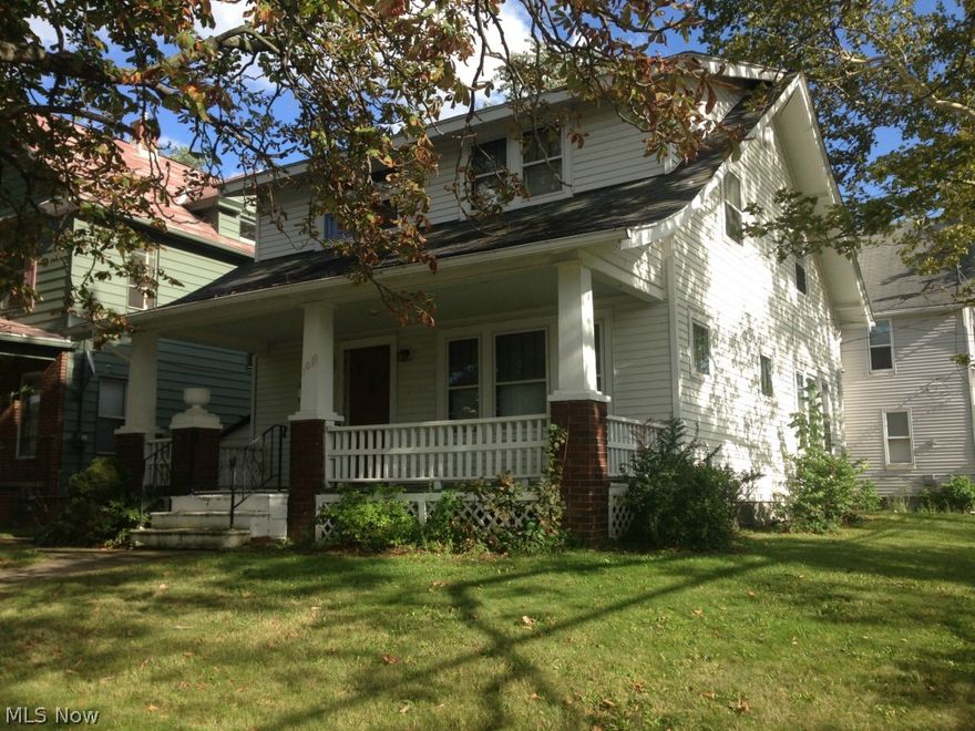 This well kept 3 bedroom, 1.5 bath corner lot Colonial shares awesome views of Historic Downtown Lorain and beautiful Lake Erie.  It is walking distance to almost everything you need! The home boasts large living areas including the living room, dining room, master bedroom and bathroom.  Convenient first floor half bath. Upstairs bedrooms are roomy with ceiling fans.  The furnace, hot water tank and roof are newer.  Charming covered front porch to enjoy the evenings on.  Close to the lake and Lakeview Park, City Hall, Spitzer Marina, Lorain's Bascule Bridge, the Palace Theater, public transportation and more.  Priced to sell.  Must See!!!!