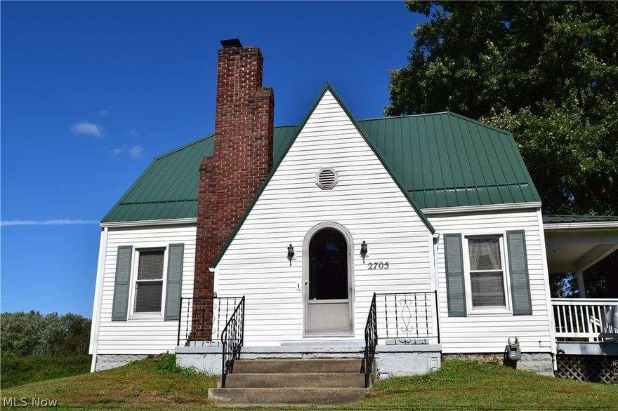 Well maintained home with many updates within the past year.  On the main level, you will find a large living room with wood burner/fireplace, a formal dining room with hardwood floors, a spacious updated kitchen with new cabinets, countertops, and large breakfast room, a master suite w/private bath and office area, and a half bath. Upstairs you will find two bedrooms with a lot of storage and a full bath.  The lower level holds the large family/game room, laundry room and another room that offers multiple use possibilities.  In addition to the updated kitchen, other updates include the master bathroom, half bathroom, light fixtures, paint, and a new metal roof. This home also has two 2-car garages giving you space for 4 cars, 3 porches, paved driveway and a portion of the yard is fenced.  This home has been very well cared for and is move-in ready.  Nothing to do, but move in.