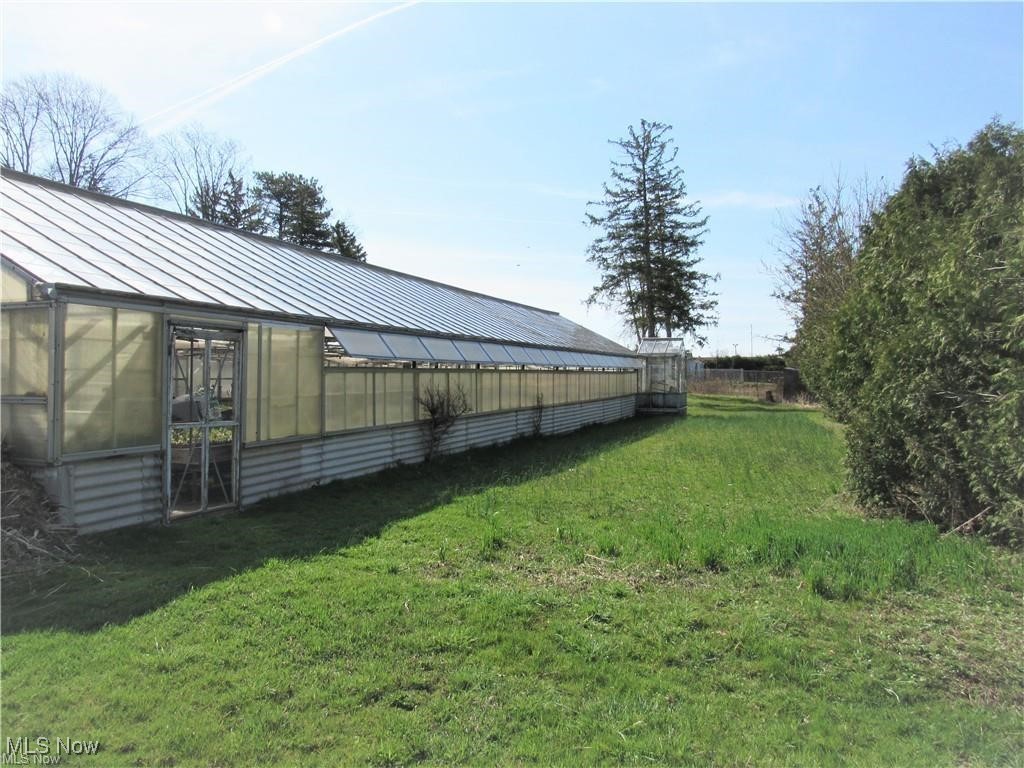Location! Location! Location! Long time family owned! Almost 2 acres of industrial land. Currently used as a greenhouse. Approximately 14,000 square feet. Includes two houses, two garages and huge workshop. Incredible opportunity. Approximately 200x435 lot size on a busy street and corner! House addresses are 13462 and 13500 York Road. Parcel #'s 483-15-001 and 483-15-002. Value is in the location!