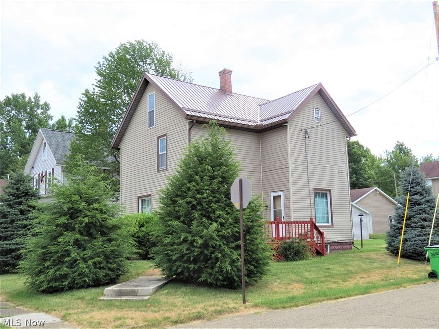 Recently Updated 2 Story 3 Bedroom in Carrollton! Newer metal roof, lots of fresh paint, several windows repaired, and electrical cleaned up. House features replacement windows, 1st floor laundry, large wooden deck, and large corner lot with room to add a garage. Call to schedule your showing of this affordable home!