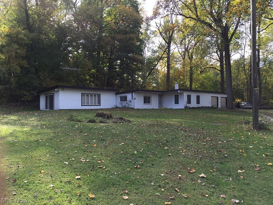 Sells on location to settle the estate: Monday – November 16th, 2015 – 5:00PM - Martin Estate Auction - Nice 8 Acres Wooded Land - With 3 Bedroom Home – Large Trees - All Mineral Rights Transfer - 2-Car Garage – Beautiful Setting - Nimishillen Twp. – Stark Co., Ohio - Louisville Schools  - Real Estate: Features nice 8.04 acres wooded land, home located near the back w/long private drive and setting. Three-bedroom home, 2 baths, kitchen, dining room and family room, laundry, utility room, 2-car attached block garage. Rear pitched slope roof. Propane gas hot water heat well and septic. Built in 1952 w/ approx. 1,820 sq. ft. Current taxes $739.26 per half year. Louisville Schools. Home open auction day at 4pm.  TERMS ON REAL ESTATE: 10% down auction day, balance due at closing. There will be a 10% buyer premium added to the final bid to determine the purchase price. Any desired inspections must be made prior to bidding. All information contained herein was derived from sources believed to