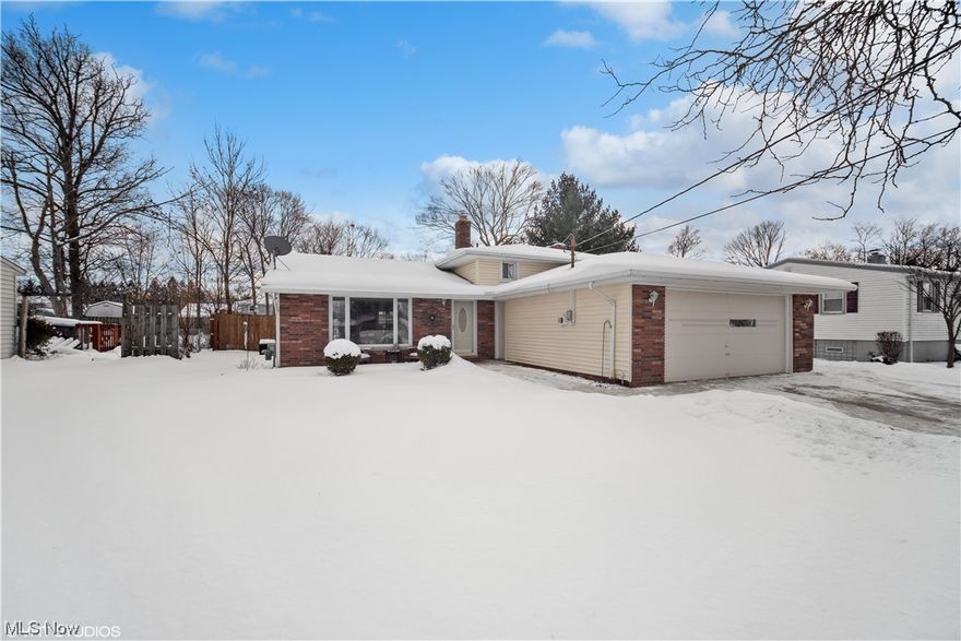 Welcome to 16295 Lanier Ave. a three bedroom, 2 full bath, three level split with first floor open floor plan. Featuring updated kitchen with granite tops , stainless steel appliances, island with breakfast bar. Hardwood floors in living room and dining room. Dining room has sliding glass doors to patio overlooking large, fenced yard.  Lower level features  spacious family room with new LVT flooring and  wood burning fireplace a great room to watch TV and relax. Off the family room is a set of steps that go up to a recreation room with a bar and sliding glass door to the back yard. Let your imagination loose on this great space and create your own dream.  Also found on the lower level is the half bathroom and laundry which offer plenty of storage. The second floor has three large bedrooms  with hardwood floors and full bathroom found off the master bedroom and the main hallway.  This home is easily found Off Howe Rd and only minutes to the highway, shopping and worship. A pleasure to show. Don't delay, show it today.