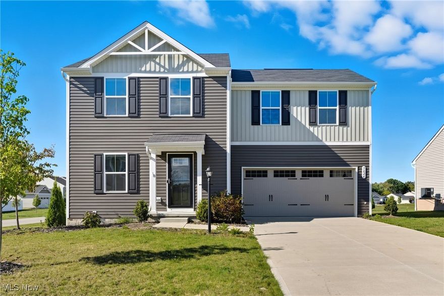 Welcome to this beautifully designed 3-bedroom, 2.5-bath home, built in 2020 and perfectly situated on a spacious double lot in the highly sought-after Westerfield Lakes community. From the moment you step inside, you'll be impressed by the bright, open layout-highlighted by a modern kitchen with white cabinetry, stainless steel appliances, and elegant finishes. The seamless flow between living and dining areas makes this home perfect for both everyday living and entertaining. Upstairs, the private primary suite offers a relaxing retreat with its own full bath, while two additional bedrooms share a second full bathroom. A convenient upstairs laundry adds ease to your daily routine. Outdoors, the landscaped corner lot is a true extension of the home. Enjoy gatherings around the fire pit on the newly added 2022 patio, or simply relax with plenty of yard space to spread out. Residents also enjoy access to a scenic walking trail and community playground-ideal for an active lifestyle. Thoughtful updates include freshly painted main-level walls, upgraded bronze hardware, a heated two-car garage, and a Google doorbell for added convenience. The basement is already plumbed for a future bath, offering even more potential. With easy access to Chippewa Lake, I-71, and Route 224, this move-in ready home combines comfort, convenience, and modern style-all in a neighborhood you'll love.