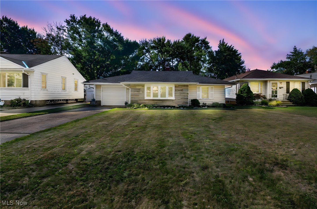 Exceptional 1-floor living at its best! Move-in-ready and affordable/spacious 2-bedroom, 1-bath ranch in Parma Heights offers comfort, updates, and a quiet, desirable location. Featuring an attractive partial stone exterior with stylish roof lines and a 2017 dimensional roof, this home is nestled on a well-kept street surrounded by pride of ownership. Inside, the spacious eat-in kitchen includes custom tile countertops, ample cabinetry, all appliances plus a large pantry to delight any cook. The inviting 16x12 living room boasts cove ceilings, a newer vinyl bay window, and an upgraded entrance door, while the updated full bath (2020) features a refreshed tub surround and fixtures. Air conditioned 15x12 enclosed sunroom with sliders overlooks the fully fenced, extra-deep backyard and will be your favorite room in the house—complete with two oversized sheds for storage. The garage and front landing are upgraded with durable Nature Stone flooring. Recent improvements include a new tear-off dimensional roof (2017), gas furnace, central A/C, and hot water tank (2018), front door (2020), newer vinyl windows, fresh interior paint, updated fixtures. Situated in a sought-after neighborhood close to schools, Southland Shopping Center, restaurants, and the Metroparks, this home offers unbeatable value. Immediate occupancy available—move right in and enjoy!