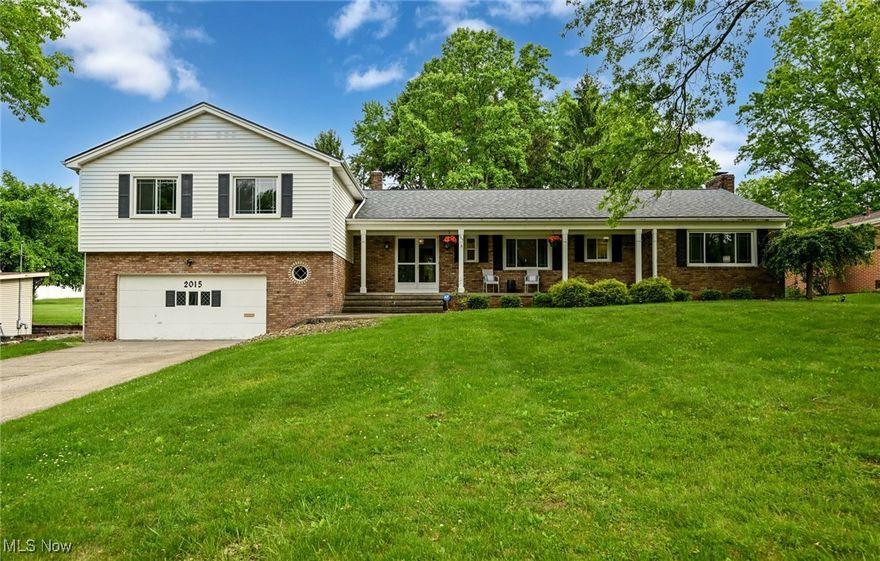 Welcome to this beautiful split-level home in West Akron featuring 4 bedrooms, 2 full bathrooms, and 2 half baths. With a spacious layout and fresh updates throughout, this home offers both style and functionality.

Step inside to find new luxury vinyl plank flooring, fresh carpet, and updated paint throughout ('25). The main floor features a welcoming front porch, a spacious living room, a family room with vaulted ceilings and an impressive brick-to-ceiling fireplace, a dining room, and an airy eat-in kitchen with plenty of natural light, perfect for everyday living and entertaining.

Upstairs, you'll find generously sized bedrooms and two well-appointed full bathrooms. The lower level offers flexible living with a large rec room and an additional finished room that could serve as a fifth bedroom or private office, great for guests, working from home, or extra space to spread out.

Enjoy the outdoors in the spacious backyard, ideal for relaxing, playing, or entertaining. Other notable improvements include a roof replacement ('20) and updated windows ('23). This home has been thoughtfully maintained and is ready for its next chapter.