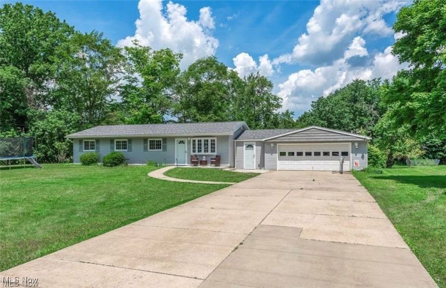 Welcome to this beautifully maintained ranch-style home nestled at the end of a quiet DEAD END STREET in desirable Aurora, Ohio. Situated on a spacious HALF-ACRE LOT, this home offers privacy, comfort, and convenience in a serene neighborhood setting. Step inside to discover a warm and inviting layout featuring three generously sized bedrooms, plus a versatile bonus room that has been thoughtfully converted into a FOURTH BEDROOM—perfect for guests, a home office, or additional living space. With two full bathrooms. Kitchen area has plenty of cabinets; beautiful counter tops with an open floor style including ALL APPLIANCES. The living areas flow seamlessly, offering cozy charm and functional design. The attached garage provides added convenience, and the concrete patio out back is ideal for summer cookouts, relaxing evenings, or entertaining under the stars. Whether you're starting out, downsizing, or looking for one-floor living with room to grow, this property combines comfort and practicality in a location that’s tough to beat. Don't miss your chance to own this hidden gem in Aurora—schedule your private showing today