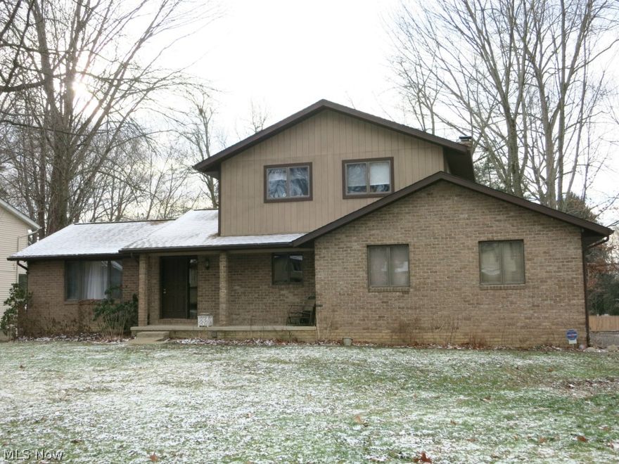 Lovely 3 bedroom, 2.5 bath colonial located on a tree lined cul-de-sac street. Nice eat-in kitchen. Huge step down family room with amazing stone gas fireplace. Patio door opens to a great deck overlooking a nice wooded backyard. Amazing laundry room - totally updated with so much room! 3 large bedrooms up. Finished basement - rec room and off set space for an office, nicely updated with new carpet and drywall. Adds approx. 625 S/F to this already spacious 1972 S/F home - almost 2600 S/F of total living space. This home is move in ready and a must see!!!