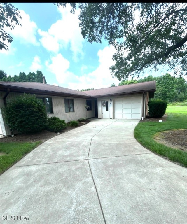 A triplex end unit condo with great natural lighting. The living room and kitchen each have a window overlooking an open field (a unique feature!). A sliding glass door in the living room opens to a patio secluded by a stand of tall pines. A spacious primary bedroom shares the same view as the living room slider. The one bathroom, including a walk-in shower, is accessible from the primary bedroom and also the hallway outside the second bedroom. The garage includes a ramp and a wall of built in shelving. A transferrable home warranty is in effect until May, 2028. This friendly, 55 plus community, includes a club house and lots of green space to enjoy.