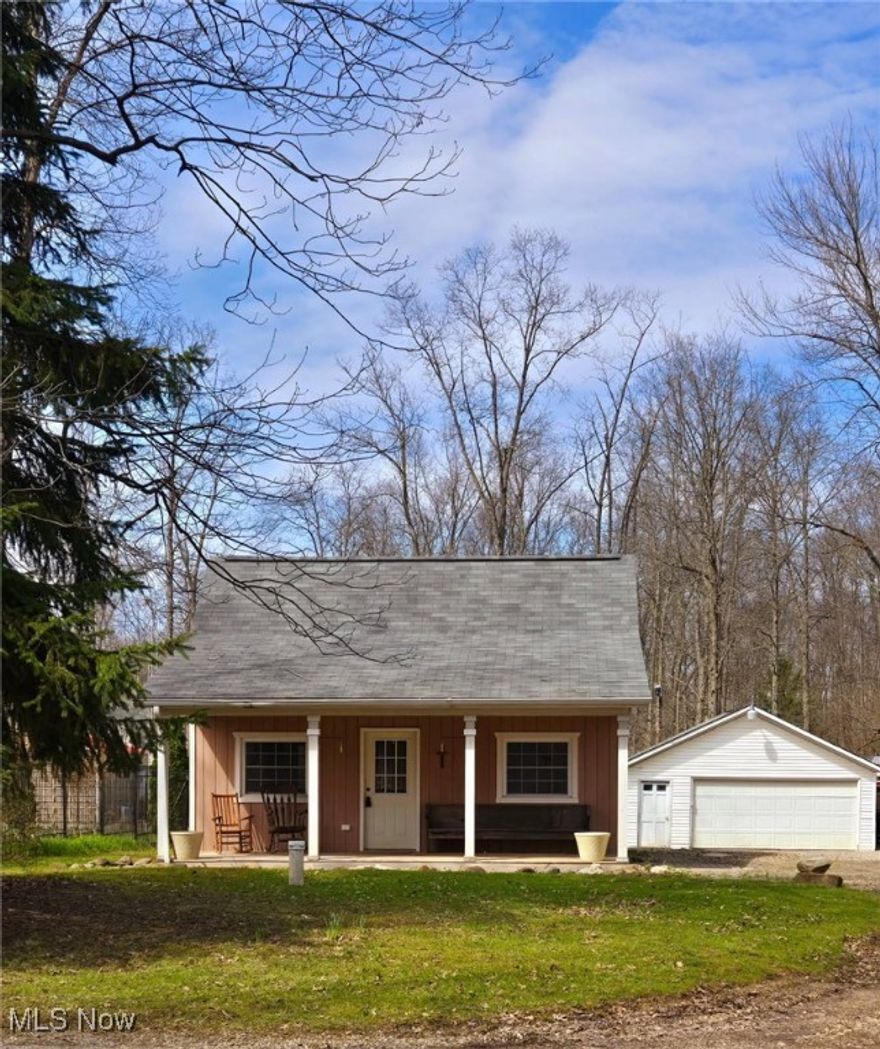 Take a look at this RARE opportunity. Straight out of a story book sits this ADORABLE tiny home near the LAKE with its own DOCK! This is the perfect chance to secure your piece of heaven and enjoy life at the lake! Custom tiny home featuring inviting front porch, large, cathedral living room with kitchenette area. Private first floor bedroom and bath with additional bedroom area in the loft! 2 car garage and a private backyard round out this piece of summer paradise. Get in before all the summer fun starts at the lake! Private dock access right in the neighborhood. Don't wait, this rare gem won't last!