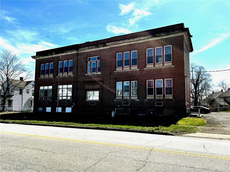 Over 8000 sq. ft. brick, multi-use, commercial building. 2 car attached garage, full basement, loading dock at rear of building w/large storage room. 8 offices on the first floor & 4 large rooms on second floor. 2 furnaces (2012), 40 thermopane windows (2012), 2 half baths on premises.