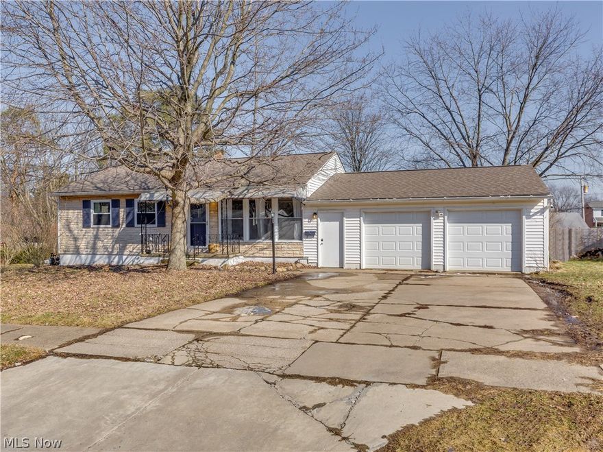 Welcome to this 4 bedroom 2 full bath ranch home located in Stow/Munroe Falls CSD. Walk into the living room with hardwood floors, beautiful crown molding and is open to the eat in kitchen. Large windows across the front allow for lots of natural light. Eat in Kitchen has high end stainless appliances and is big enough for a large table and is open to the sun room. The sun room is light and bright with tons of windows for great natural light. Off the sun room is the large laundry/mud room w/ access to the garage and backyard. Three bedrooms are nice sized and full bath close by with double vanity and tile floor. The 4th bedroom is large with walk in closet and full custom bath. Washer and dryer hook ups are still available in this area. Beautiful large built in fish tank with amenities for proper care and cleaning. There is an over sized two car garage with workbench, pegboard, heat and attic space above for additional storage. Outside is a fenced in backyard for privacy and a beautifu