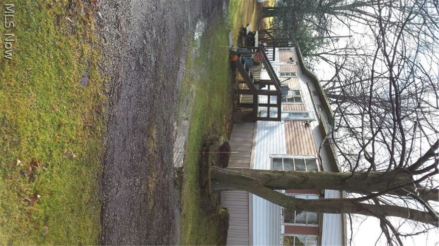 Welcome to 2360 Industry Rd.  This well maintained 1979 Holly Park is a peaceful place to call home.  This home boasts spacious rooms and nice built ins.  The open kitchen has a pantry and is open to the dining room.  The dining room has a built in hutch and china cabinet.  The family room has high ceilings and an entry closet.  The master bedroom offers a spacious closet and built in dressers for extra storage.  There are dual sinks in the bath/laundry room.  The home sits on 1.62 acres.