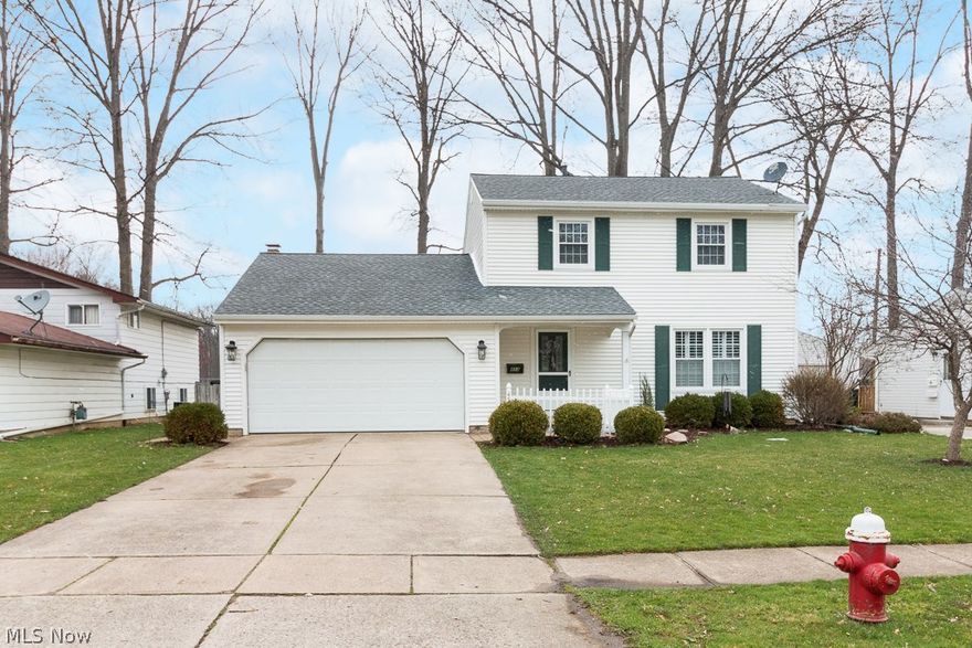 Move right into this completely updated & well maintained 3 bedroom colonial with additional bonus bedroom in lower level.   As you approach this charming home & enter through the front door you will notice the quality updates to this property.  The main living room has been tastefully decorated & features new carpet & plantation shutters.  The dining room features updated flooring & lighting.  The kitchen has been updated with all new appliances & features Corian countertops.  A half bath perfect for guests is conveniently located off the main foyer.  The family room is complete with gas fireplace, built in bookshelves, hardwood floors, & an Anderson sliding door, which steps out to the 10x15 sun room & back paver patio all overlooking the fenced yard which backs up to the city park.  The 2nd floor features three bedrooms with hardwood floors & a spacious bathroom with his & her’s sinks.  The lower level has a laundry/utility area with newer washer & dryer, workbench, rec room & 4th b