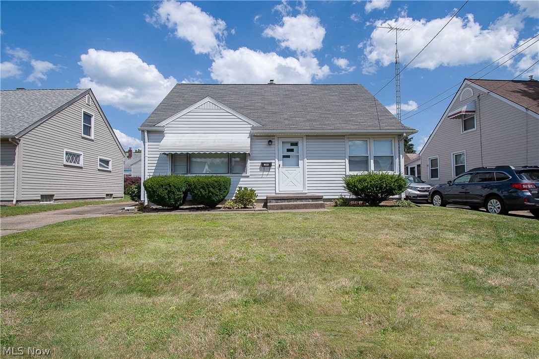 This adorable bungalow home is ready for a new owner. Enter onto the living room, and you will love how bright and well-maintained it is—recently painted throughout (neutral colors). The dining room is open to the living room and leads you to the eat-in kitchen that offers white cabinets, tile backsplash, pantry, a dinette area, and access to the three seasons room (7 x 14) overlooking the backyard. Two bedrooms (with hardwood flooring) and a full bathroom (with tile floor) complete the main floor. Upstairs offers two other bedrooms with built-in/drawers/shelves/desk and plenty of storage space. The full basement could be finished as a living space and has a laundry area with a utility sink. Detached one-car garage with a concrete driveway. Updates include painted inside the home (7/2021), installed carpet in the living room & steps (2020), installed cabinets in the kitchen (2014), all new blinds (2020), updated plumbing in the kitchen, bath & basement (2010-2021), updated electric wir