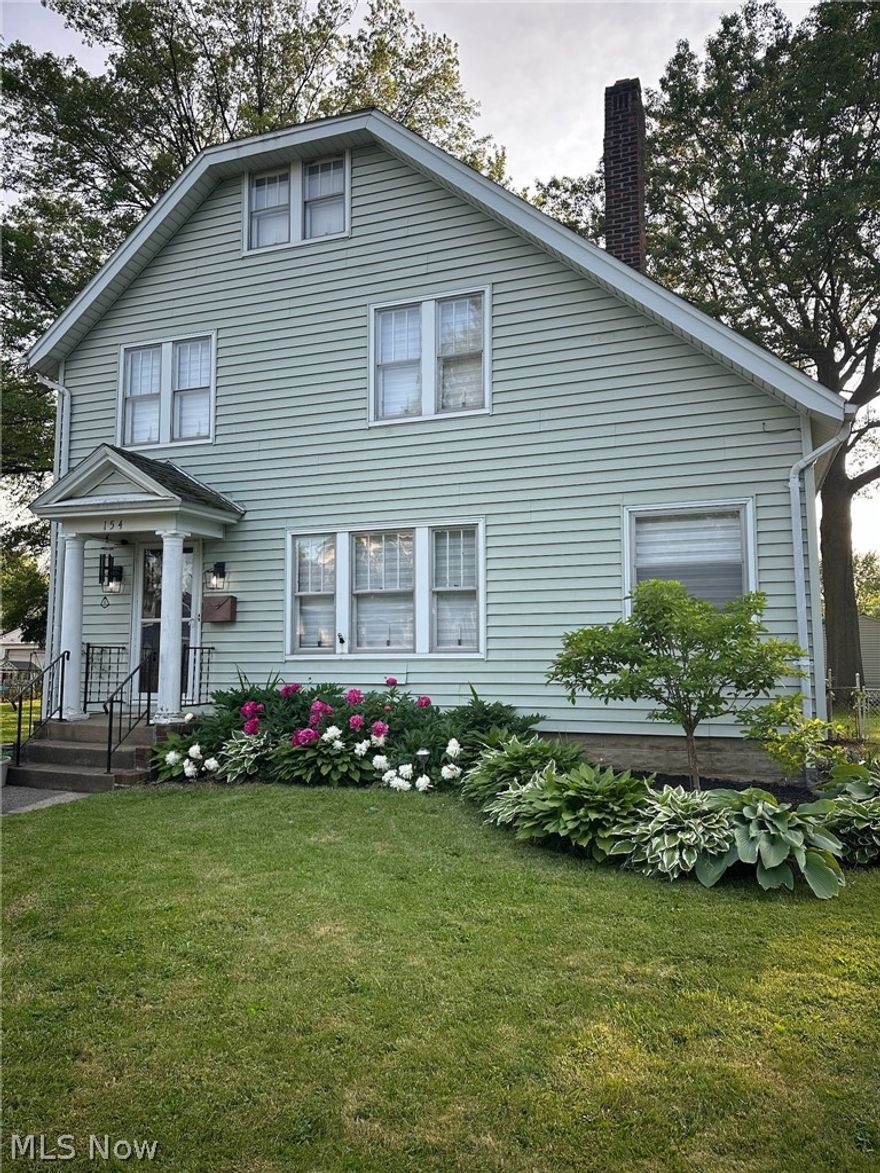 Welcome home to this amazing, renovated Colonial! Enjoy cooking in this sun-filled kitchen. There are plenty of countertops, cabinets, and space for storage. This lovely home has 2 newly renovated full bathrooms, 3 spacious bedrooms, and a large living room. New light fixtures have been installed along with many more updates, including a new furnace, and central air conditioning system. The bathrooms have been renovated and toilets have been replaced! The home has also been freshly painted, and kitchen cabinets have been refinished. There is a massive 3 car garage to store all your belongings, create additional living space or work on projects and hobbies! Enjoy outdoors relaxing in your oversized backyard whether you?re grilling or reading your favorite book. An outdoor swing, firepit, new landscaping, planter boxes, greenhouse, and a water feature complete this backyard oasis worthy of entertaining family and friends. For all you Cleveland sports fans this beauty is only 35 minutes from Huntington Bank Field, Rocket Arena, and Progressive Field. Conveniently located within minutes of shopping, entertainment, world-class restaurants, hospitals, and parks this property is a must see. Come and see this move in ready home today!