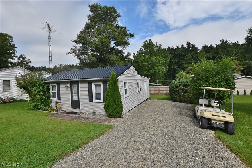 Adorable and completely renovated turn key cottage in Sunset Valley at beautiful 1540 acre Atwood Lake. This well cared for cottage is in meticulous condition and ready for you and your family to move in & begin creating wonderful lake memories. The open format living area includes a living room with a electric fireplace, a dining area and kitchen. When I say turn key, it comes fully furnished, all appliances including washer and dryer and even all the kitchen ware & linens will remain. In fact, the owners are even including an electric golf cart to get to your dock slip or cruise around the neighborhood. Recent improvements include a new metal roof, new paint throughout, new washer & dryer, wall heater & iron filter. Large back deck to enjoy cookouts and entertaining. A storage shed has electric and provides nice storage for lawn equipment. A private back yard offers a fire pit for your families enjoyment. This home was mostly remodeled in 2012 and had all windows replaced at that tim