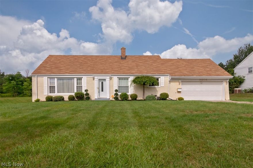 Phenomenal opportunity for your next home or investment property in Beachwood! This charming split-level home features a vaulted great room, an updated kitchen, and a walk-out lower level. It is just waiting for your finishing touches! As you step inside, you will immediately notice the lovely hardwood floors and large windows in the vaulted great room. The kitchen features newer cabinetry, newer appliances, and a breakfast bar. Upstairs, the master bedroom has two closets and an en-suite half bathroom that connects to the full bathroom. Two additional bedrooms and a wall of built-ins complete the upper level. The walk-out lower level includes a spacious recreation room, perfect for a media room or home gym, plus a laundry room and a full bathroom. Outside, there is a newly paved patio that is perfect for summer cookouts, and the .43 acre yard provides plenty of space for games and gardens! Located just off of Richmond Road on a quiet street in Beachwood, this home is just minutes from