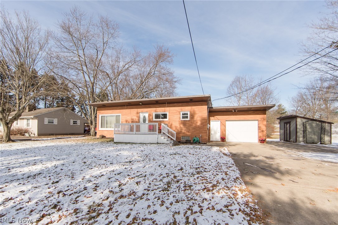 Talk about an amazing house. This ranch has 3 bedrooms, 2 baths, open floor concept, hardwood floors throughout, and sits on one acre. Like coffee.., who doesn't... enjoy your morning or afternoon coffee on the front porch or back porch. Need more space? The large finished basement, with an extra bedroom, is a great place to hangout. House is priced to sell and won't last long. Set up a showing today to be the next one to call this place home!