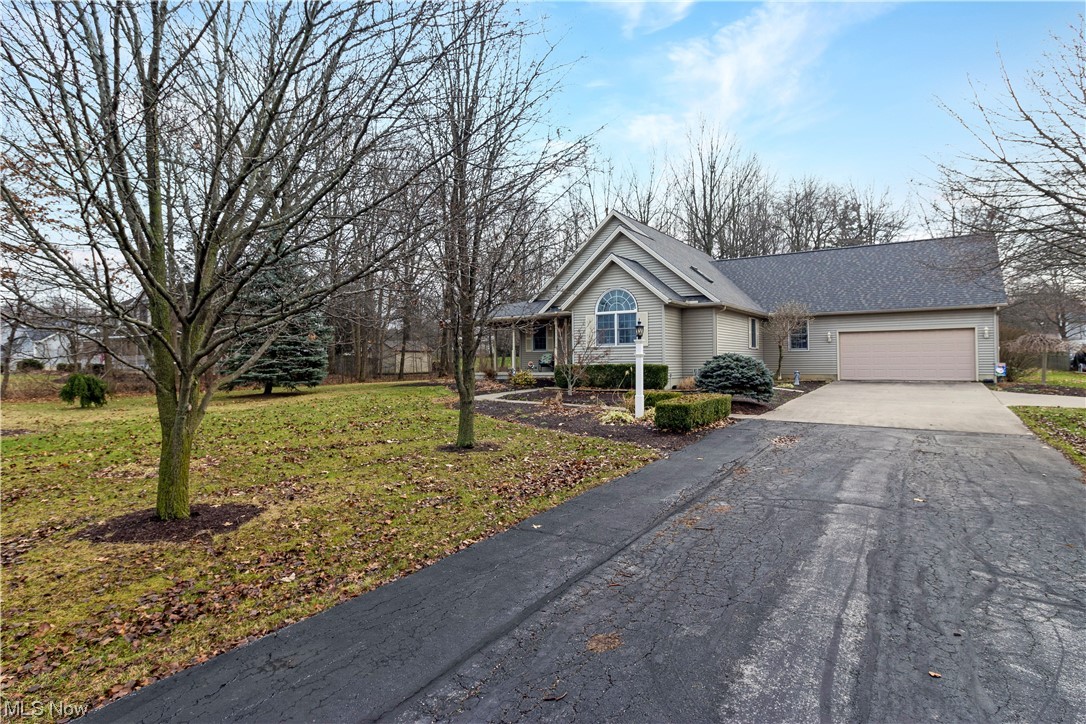Step into luxury as you enter this contemporary three-bedroom, two-bath ranch in Vermillion, Ohio. The wow factor begins with the grandeur of pillars that greet you at the entrance, setting the tone for the elegance within. The heart of this home is a chef's dream! Revel in the sleek and modern kitchen featuring eye-catching granite countertops. A perfect blend of style and functionality, this space is sure to inspire culinary delights. Experience the beauty of nature indoors with recently installed nature stone flooring. This elegant addition enhances the aesthetic appeal while providing durability and easy maintenance. A touch of nature in the heart of your home. Enjoy all the changing seasons from the comfort of your own home in the expansive three seasons room. Flooded with natural light, this versatile space invites you to unwind, entertain, and appreciate the beauty of every season, all year round. The lower level has been finished creating the perfect space for gatherings and celebrations. Roof and Gutter Guards 2022 - Sump 2023. Call today for your private tour!