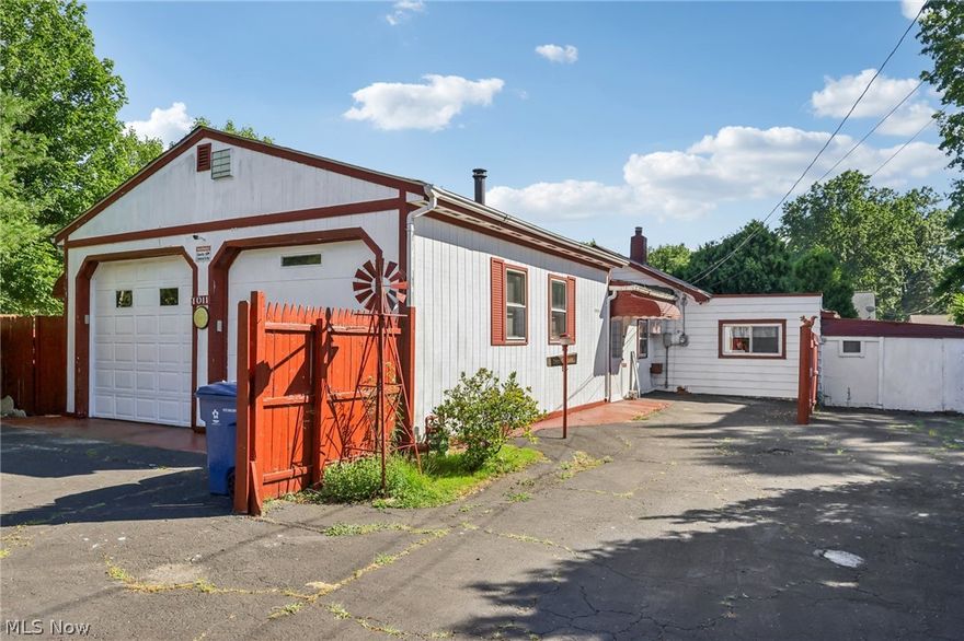 Have you ever wanted to own your own mechanic or painting business but didn’t have the space for it? Look no further! This 3-bedroom, 2.5-bath Ranch offers all the convenience needed for a home-based business. Featuring two tall bay garage doors, there is ample space for working and storage in the heated garage. A half bathroom in the garage provides a convenient spot for short breaks or cleaning up. The turn-around paved drive facilitates easy transport. Inside, the living room boasts a vaulted ceiling and leads to the dining room through sliding glass doors. Two cozy bedrooms are off the dining room, while the master bedroom, located towards the back, has its own heating and cooling system and direct access to the fenced backyard. There are two full bathrooms, one on each side of the home. The kitchen features new granite countertops, and there is new carpet and LVT flooring throughout. Additionally, there is a second garage or storage area, as well as a back workshop. This property offers immense potential and is nestled right next to a park just under three acres. Check out your future today!