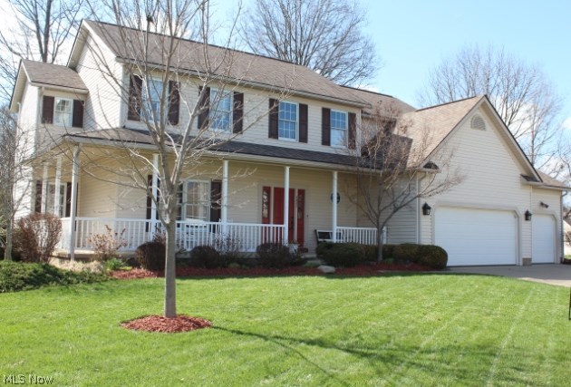As you approach this beautiful home with a wrap around porch you will notice how well maintained everything is. Entering the front door there is a two story foyer with wood floors. Throughout the home there are nine foot ceilings. Entering from the garage there are custom built cabinets and cupboards for storage in the laundry room. The kitchen is a cooks dream. Lots of cupboards and counter space and an island. There is also room for a large table. There is a fireplace in the cozy family room. The sunroom off the kitchen has two skylights and a nice view of the backyard with ponds, paver patio, deck and private back yard. The 4 bedrooms upstairs are spacious with walk in closets and the master bath has a glamour tub. The basement is totally finished with an exercise room, a room with a built in bar, and a room large enough for a pool table. The Bryant 3 stage high efficiency furnace was put in November 2012, hot water tank 2014, new lighting in foyer and kitchen, freshly pain