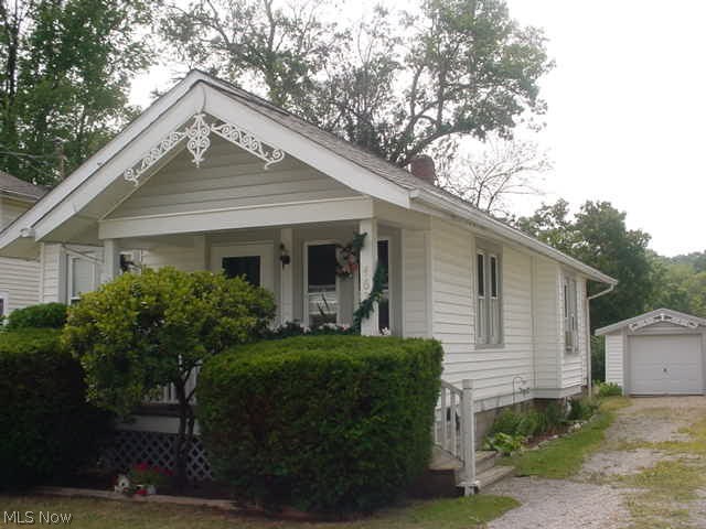 Well maintained ranch close to Goodyear Metro Park. Interior redrywalled 1991, kitchen remodeled 1992, windows 1993, porch & garage door 1997, vinyl siding 2002, hot water tank 2009, roof & gutter guard 2012, new water line to house 2016. 2 bed ranch w/hardwood floors, formal dining room w/built ins and full basement! 1 car detached garage! Covered front porch! Blown insulation 2002! Nice!