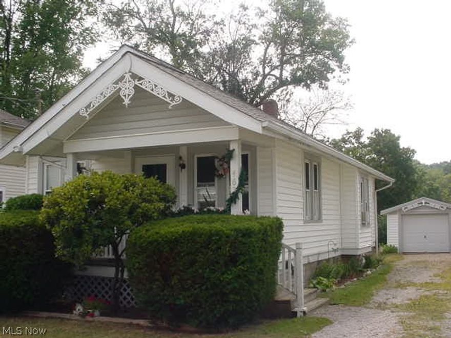 Well maintained ranch close to Goodyear Metro Park. Interior redrywalled 1991, kitchen remodeled 1992, windows 1993, porch & garage door 1997, vinyl siding 2002, hot water tank 2009, roof & gutter guard 2012, new water line to house 2016. 2 bed ranch w/hardwood floors, formal dining room w/built ins and full basement! 1 car detached garage! Covered front porch! Blown insulation 2002! Nice!