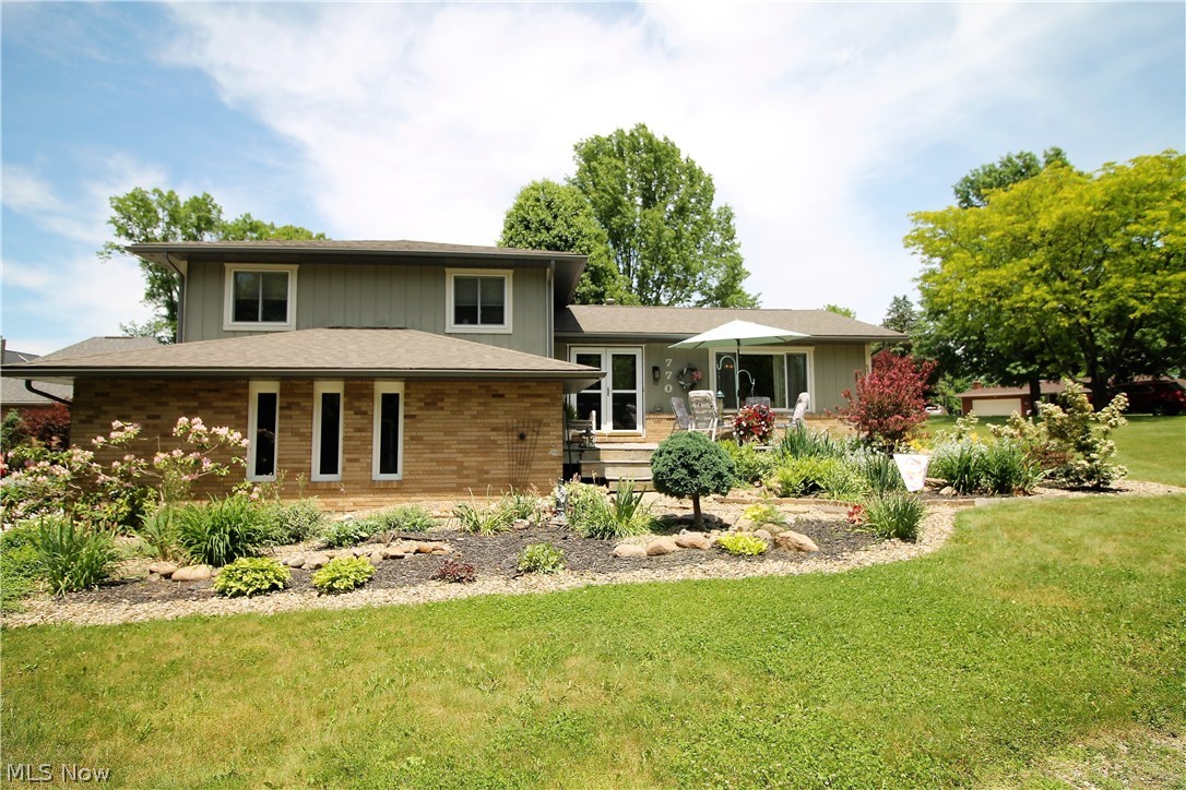 Pristine beauty in this charming split level gorgeous home. Come on in from the front deck which has newer landscaping in the front yard, and enter into the open foyer to the kitchen, living room, dining room. The living room offers a cozy setting that is open to the dining room area. The kitchen has abundant of cabinets and counter space in neutral colors, backsplash (2015), new sink, faucet (2015), and new stove (2020), dishwasher and fridge (2015), sliding doors (newer 2016) to the patio which offers natural sunlight shining through. Upstairs you will find the large master suite with full bathroom. There are two more bedrooms and updated full bathroom with newer (2018) flooring, toilet, mirror, sink, counter, and resurfaced vanity. The lower level has the family room, remolded half bath (2016), gas fireplace (just cleaned) with mantle, built in shelves, and sliding doors to patio. So much room in this home for entertaining. This home sits on 1.2 acre and has so much to offer outside