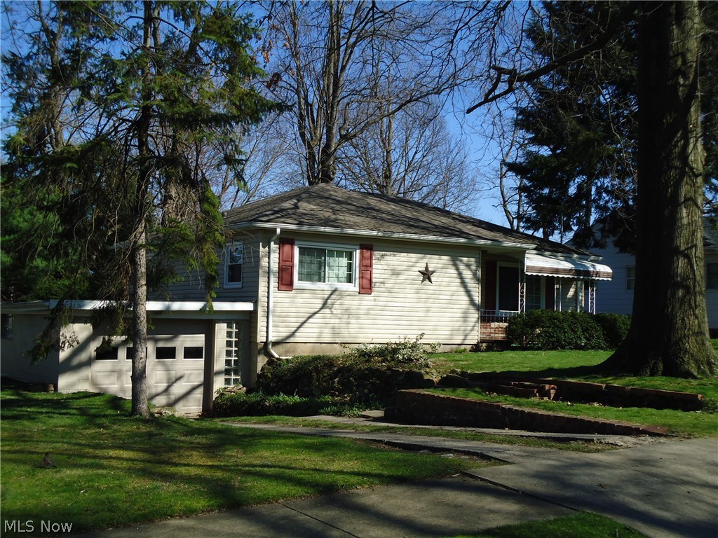 Freshly painted and updated Ranch style home on quiet, dead-end street in an area of well kept homes! Beautiful hardwood flooring throughout! Gorgeous updated bath (2010) from the studs out! Spacious living room with picture window. Large eat-in kitchen with appliances. Newer vinyl siding and dimensional roof. Updates include a 96% high efficiency furnace with air cleaner (2012)----hot water tank (2015)----insulated vinyl replacement windows with 30 year warranty (2009)---- insulated garage door & new opener (2015). Huge basement plumbed for toilet, could be a great rec room and offers plenty of storage. Pretty treed lot and 1 car attached garage too! Ellet schools. Great location--close to schools, shopping & freeway! Call today for a private showing!