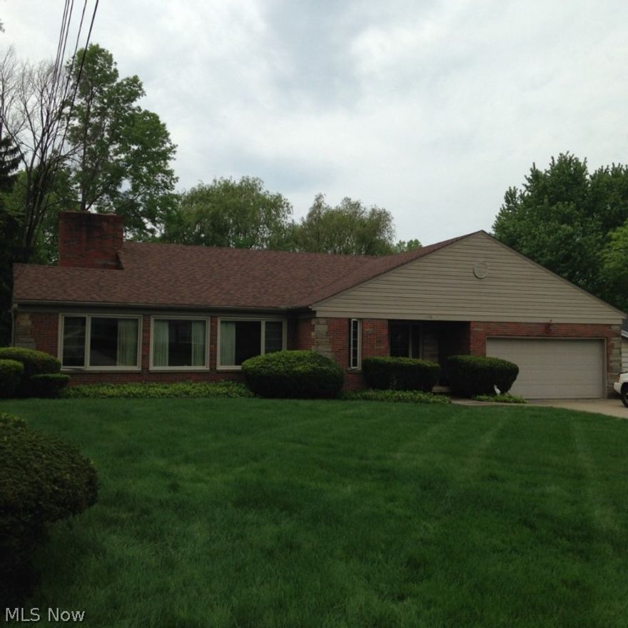 Fantastic Ranch for rent in West Akron!  This sprawling home boasts 3 bedrooms, 1.5 baths and a finished basement with a rec room and an additional bedroom or office!  2 car attached garage leads you into the updated, fully applianced kitchen with granite. Open floor plan through the dining room, formal living room and fireplaced den. Nicely sized rooms and double closets in the master.  Nicely landscaped yard, both front and back! Dont miss this one!