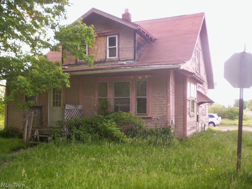 Relax on a country acre with scenic views.  Corner lot.  Looking to build?  Well and septic in existing home. Great location with lots of possibilities!