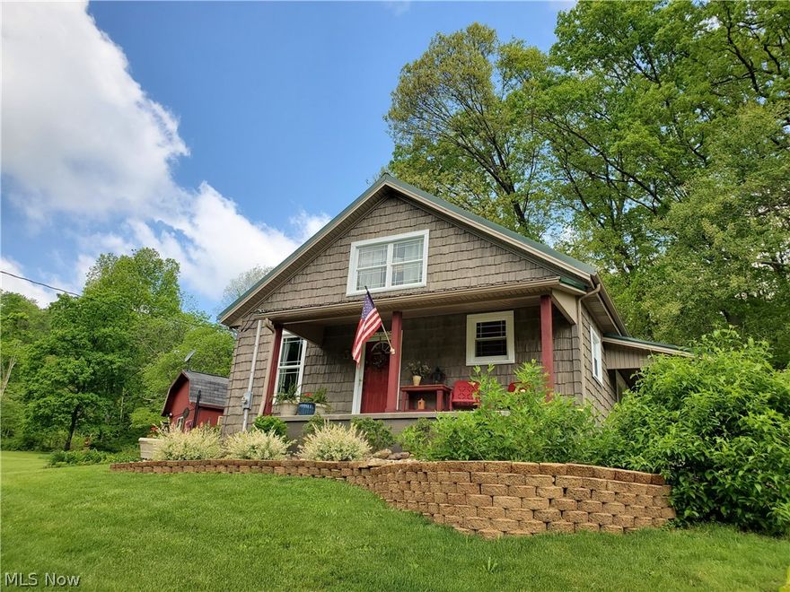 Lake living! Beautiful country setting on paved Twp. Road. Just 3/4 mile from Tappan Lake, 2 miles to Tappan Boat Launch and 3 miles to the new Tappan Marina and Restaurant. Totally renovated home on 7-1/2 acres of lawn and woods. Prime location for hunting, fishing or just enjoying the lake. All newer windows and siding. Newer electric and plumbing. Newer culvert under driveway. Drive around home on driveway graveled 3 years for solid drive. Extensive landscaping with 40+ new bushes and trees. Large nicely painted shed for carpenter shop. Carport has been enclosed for storage. New shed built for BBQ grill. Patio with fireplace and Pergola with covered Wisteria. Newer well and new heat pump for heat and air. Newer wood flooring and carpet throughout home. New fridge, washer and dryer. New backsplash in kitchen. Newly remodeled bathroom with large shower. Enclosed attic upstairs and large closet. Newly painted interior. Some furniture to remain. Security system in home stays - owner pur