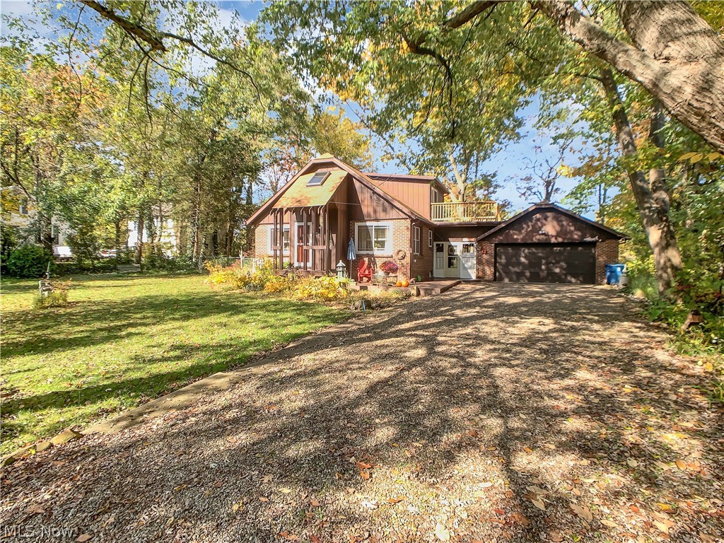 A Portage Lakes *Waterfront Beauty on Long Lake* Long Lake is Not the main chain but will charm and please you. the Privacy & easy access to Long Lake makes this beloved home a must-have! An inviting floor plan with living room, dining room & 3 bedrooms on the first floor.**Seller has made many updates: windows, the roof is 3 yrs old, gas furnace & A/C approx. 10 yrs. old. A 2nd-floor pleasing jumbo master suite w/a private deck and, a walk-in closet, and a full bath. Your gonna love the double lot, parking, and 2 docks on Portage Lakes *Long Lake**. Schedule your showing today before the lake home is gone.