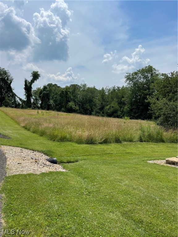 Building lot on a cul de sac . Public easement in place to access this property. Private area with minimal traffic. Great building lot! Easy Access septic needed and county water available. None on the property right now. 1.26 acres! Just waiting on you!