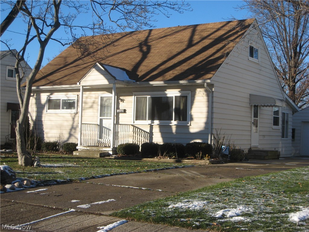 What a great house!Move right in and relax in this nicely update cape cod just a half block from Lincoln Elementary School and walking distance to Roberts Middle School. Walk into the spacious living room with picture window. The first floor master has double closets and the second bedroom has a double closet too. Updated full bath with tub/shower, newer vanity and lighting. Upstairs there are 2 more bedrooms and a newly installed full bath. Relax on the deck or on the enclosed porch just steps off the kitchen. The ample applianced kitchen with eating area has easy care laminate flooring. There are vinyl replacement windows throughout, newer roof and a 90% high efficient furnace to lower your utility bills. Take advantage of the low utility costs in Cuyahoga Falls as well as the community activities. Freshly painted and carpeted throughout. You will love the convenient location. Just minutes to Rt.8, schools, shopping and the neighborhood parks and playgrounds. Seller will pay buyers c