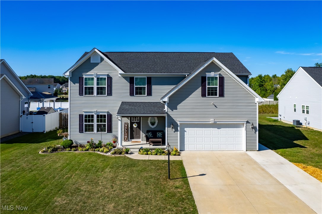 Welcome to the Palermo floor plan in the sought-after Timber Ridge community of North Ridgeville! Designed with a modern lifestyle in mind, this 5 bedroom, 3.5 bathroom home has an open-concept floor plan perfect for both entertaining and everyday living. The generous kitchen features abundant counter space, spacious pantry, and a large island with seating, making it a central hub for family gatherings. Adjacent to the kitchen is a sun-filled morning room, ideal for casual meals, while the formal dining room provides space for special occasions. The family room is perfect for hosting the big game, with room for plenty of guests. Tucked behind the family room is a private bedroom with a full bathroom perfect for accommodating long term guests. Completing the main floor is a convenient half bath and a mudroom with a drop zone to help keep organized. Upstairs, the primary suite has a private full bathroom and a large walk-in closet with organizers. The additional bedrooms are generously sized, and a large finished bonus room makes for a fantastic rec room or playroom. A second-floor laundry room adds convenience to daily chores. The unfinished basement offers endless potential for future expansion or ample storage. Outside, there is a large, fully fenced backyard with a concrete patio, perfect for outdoor entertaining or relaxing. Timber Ridge is just minutes from both the turnpike and I-480, making it a convenient spot for commuters. Don’t miss this incredible opportunity. Come see today!