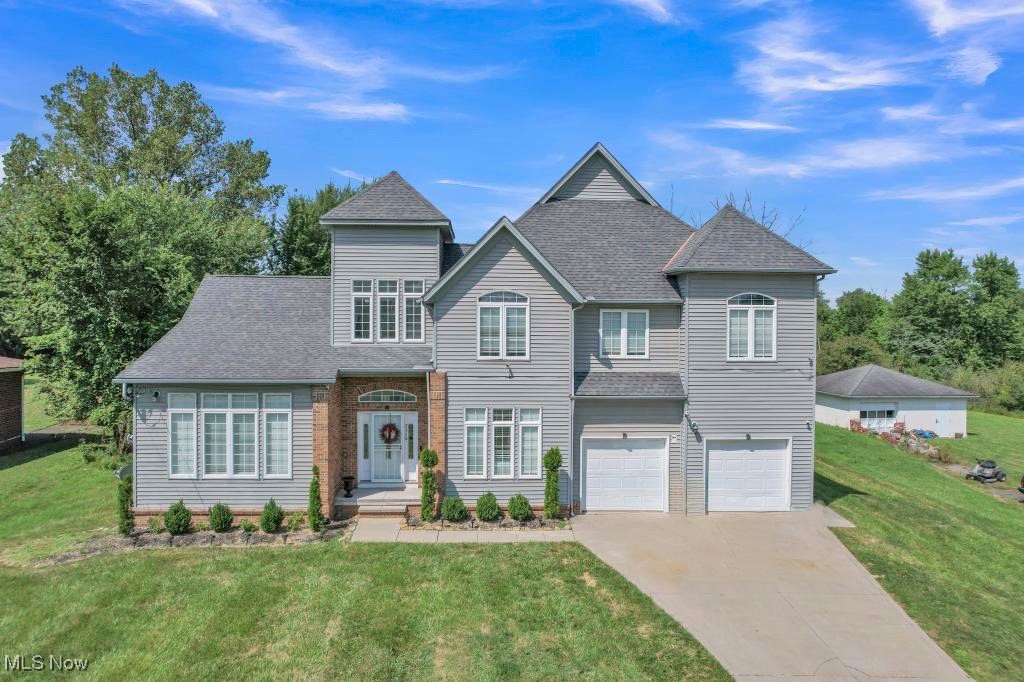Welcome to Oakwood living at its finest!
This home is truly one-of-a-kind—offering curb appeal, space, and stunning wooded views on nearly ¾ of an acre. From the moment you step into the foyer with vaulted ceilings, you’ll be impressed by the elegant split staircase that overlooks the spacious family room and flows seamlessly to the eat in kitchen. First floor laundry is just across from the garage entrance. The dining room boasts lots of light with a gorgeous chandelier. Upstairs, you’ll find generously sized bedrooms—some with vaulted ceilings—along with an owner’s suite featuring a double vanity, Jacuzzi tub, and separate shower. Newer carpet throughout. The fully finished walkout basement offers over 1,500 square feet of additional living space with soaring ceilings, a possible in-law suite, and plenty of storage, sump pump with battery back up and a full bath. Outdoors, enjoy your private backyard oasis surrounded by nature, or take a dip in your own pool. Property is in need of cosmetic repairs and updates—ideal for buyers looking to renovate or invest. This home is perfect for entertaining, multigenerational living, or simply relaxing in your own retreat. Recent updates include quartz countertops and appliances (only 3 years old!).