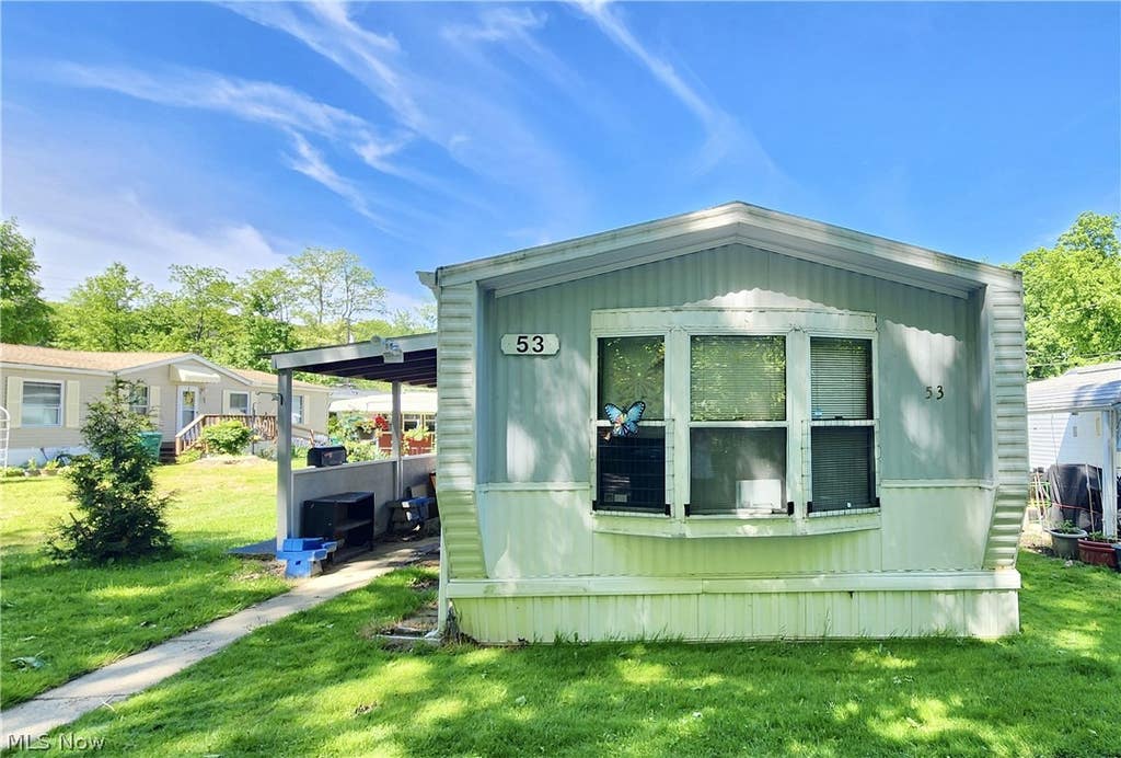 Photo of 8323 Eagle Road #53, Kirtland, OH 44060 (MLS # 5219471)