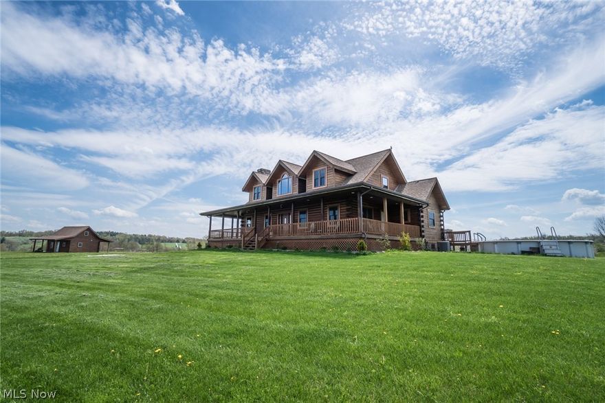 Jaw dropping inside and out. This spectacular log home has everything needed to satisfy both wants and needs. The setting is just breathtaking, trust me, you won't be disappointed. There have been substantial recent repairs and updates to this home. This property also offers a beautiful mini cabin, perfect for friends and family visiting or as an in-law suite. The massive pole building is a a great area for a workshop or barn and the fenced pasture is ready for your horses.  Love to garden? Then you will appreciate the fenced garden, perfect to grow all the table veggies you want and you don't have to share with the deer. Enjoy the above ground pool on a hot sunny day. This is the perfect property for entertaining. If you love to host, you won't want to miss out on this incredible property. Priced to sell....this one won't last long. Call for more information and to schedule your private showing.