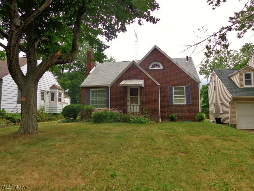 Adorable and waiting for new owners!! Spacious brick bungalow, 2 bedrooms on main floor, Large finished attic would make a wonderful master retreat with a little TLC. New paint and carpet throughout the home. Glazed block basement has been waterproofed also. Cheaper than rent or a great first investment home too! Call today!