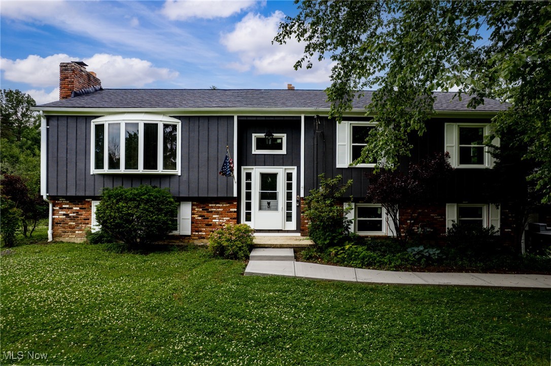 Welcome to Your Dream Home in Chesterland! Tucked away on a quiet, tree-lined street, this completely renovated 4-bedroom, 3-bath home offers the perfect blend of modern luxury and timeless charm on a stunning 1.71-acre lot. With 2,470 sq ft of living space, you’ll enjoy a spacious, open layout adorned with new LVP flooring, recessed lighting, and three inviting fireplaces that radiate warmth and character throughout. The sunroom—with its wall of windows and cozy fireplace—is a serene, year-round retreat. At the heart of the home, the chef’s kitchen features porcelain tile flooring, a generous quartz island, quartz countertops, shaker-style soft-close cabinets, and brand-new stainless steel appliances, including a washer and dryer. All three full bathrooms were remodeled in 2025 and showcase elegant walk-in showers and luxe finishes. Additional updates include a new roof, windows, interior and exterior paint, and a newly poured sidewalk—all completed in 2025. The insulated 4-car attached garage ensures comfort and convenience, while two separate living areas offer plenty of space for entertaining or relaxed everyday living. With a newer furnace and AC, all the major updates are already done. Outside, the expansive backyard has been professionally cleared through forestry mulching, offering a blank canvas for your dream landscaping. Whether you’re envisioning a garden, a play area, or a private retreat, the possibilities are endless. Located near top-rated schools, parks, and local amenities, this turnkey gem in Geauga County is ready for you to move in and make it yours.