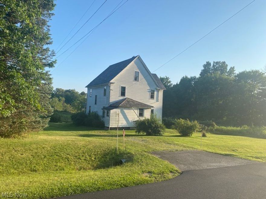 Attention investors and "flippers".  Diamond in the rough in this older farmhouse in South Range Schools. 1 1/2 acres and a 3 bedroom home with living room, dining room and kitchen.  Tons of potential.  Better hurry on this one!!