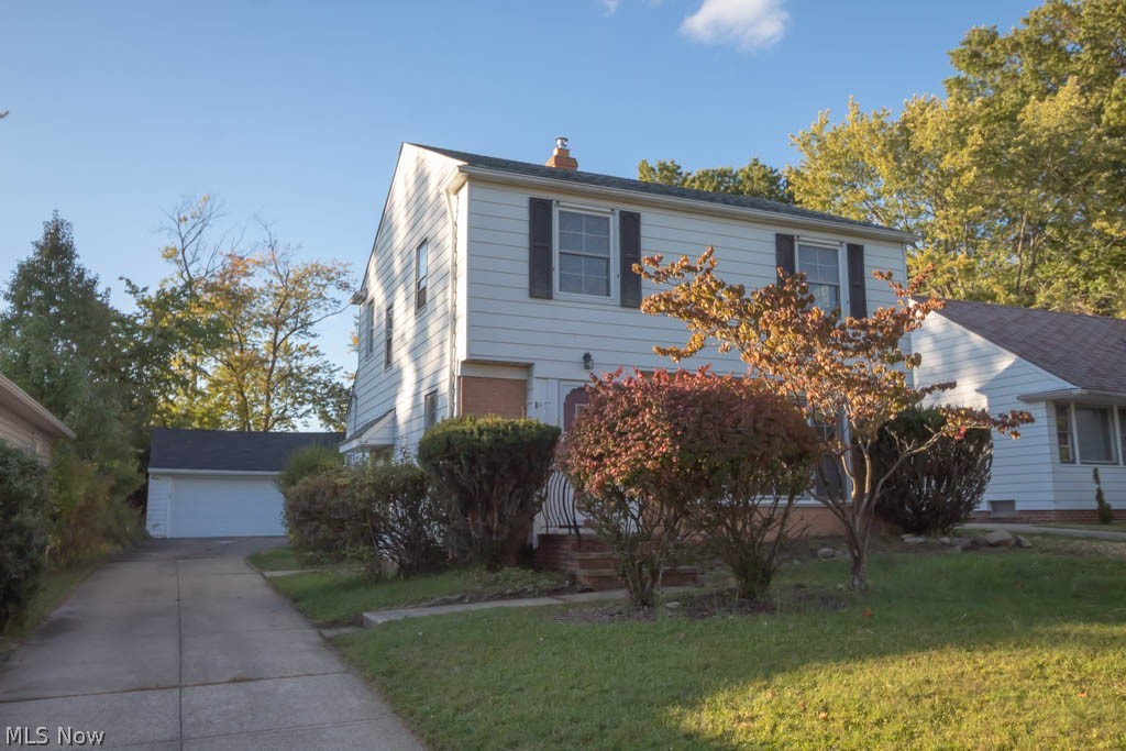 Welcome home! This 3 bedroom colonial in the heart of Bedford is move-in ready. Walk in the front entryway to find the bright, beautiful living room with original hardwood floors. Continue into the well-sized dining room with a chair rail and beautiful built-ins. The cozy family room sits at the back of the home with views of the large backyard. Whip up your favorite recipes in the eat-in kitchen with new laminate floors, a breakfast nook and fresh paint. In fact, the entire interior of the home is newly painted! Find the updated half bath on the main level as well. Head up the beautiful staircase near the front door to find all 3 spacious bedrooms and the updated full bathroom with new laminate flooring and vanity. The basement is partially finished, and holds the laundry area. This home is a must see in a perfect location. Don't miss out on this move-in ready family home!