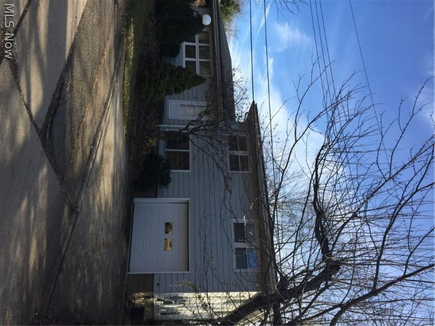 This low maintenance home is conveniently located close to the park, YMCA, school, and low-traffic street. This house boasts newer windows, updated kitchen, private patio, and oak flooring! Heated garage for those cold, winter mornings!